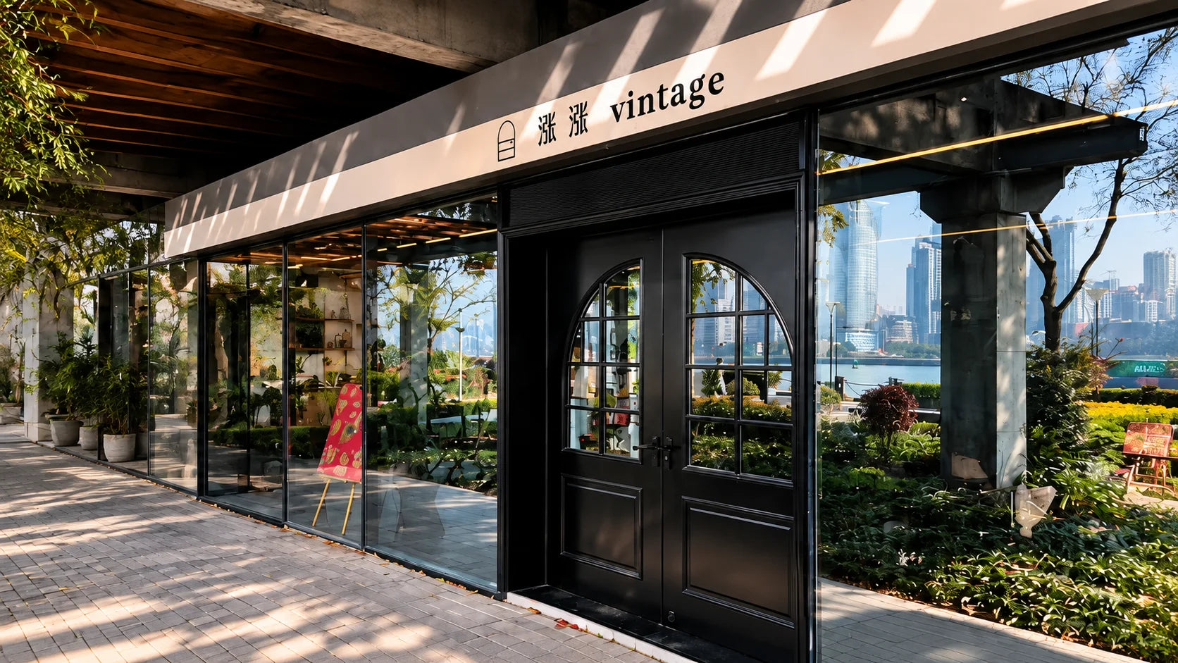 Vintage boutique storefront with sunlit windows and greenery